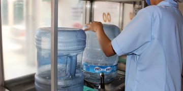 Cuantos garrafones al día vende una Purificadora de Agua?